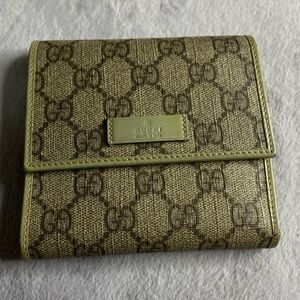 Gucci GG Supreme canvas and patent leather trifold compact wallet